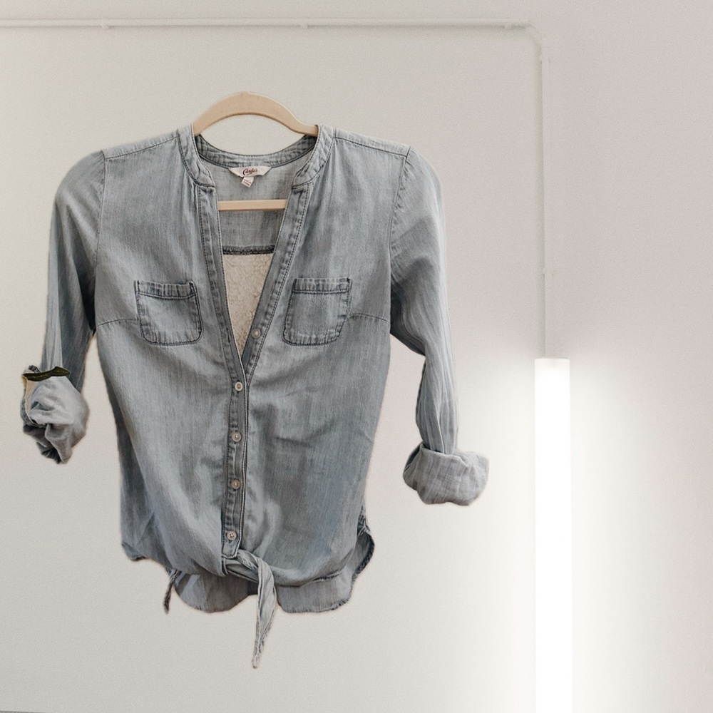 Light denim, button up shirt with a lace back
